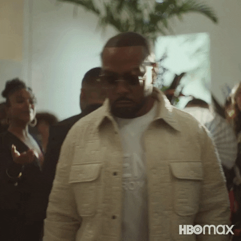 Timbaland Talking To Someone While Walking GIF