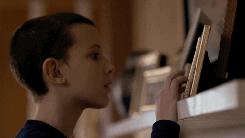 Timid Eleven Checking Out Pretty Pictures GIF