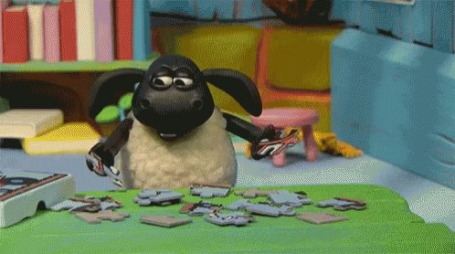 Timmy Playing With Jigsaw Puzzle Shaun The Sheep GIF