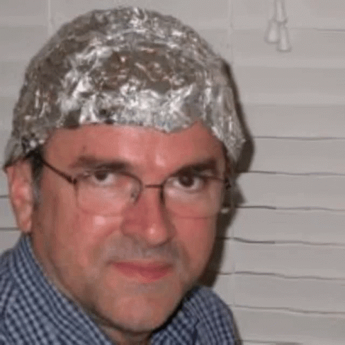 Intense Gaze Tinfoil Hat Meme GIF