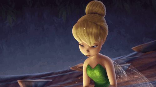 Tinkerbell From Disney 'S Tinkerbell Is Looking Down With A Sad Look On Her Face GIF