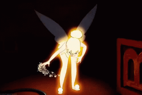 Tinkerbell Holding Fairy Wand in Dark Room