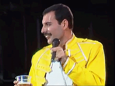 Tired Freddie Mercury Drinking Juice GIF