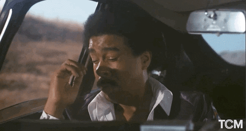 Tired Richard Pryor Yawning In Car Seat GIF