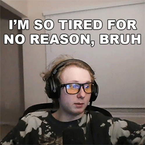 Tired Young Man with Headphones and Glasses