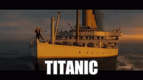 Titanic Floating In Ocean With Woman On Deck GIF
