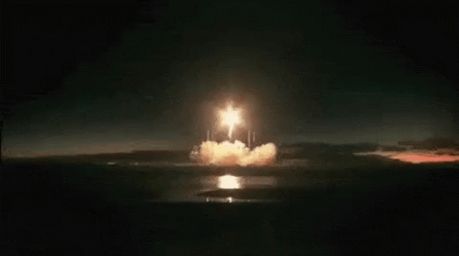 To The Moon Astronaut Driving The Rocket GIF