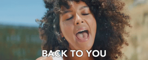 Girl Singing Back To You GIF