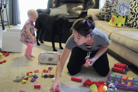 Toddler Making Carpet Messy GIF