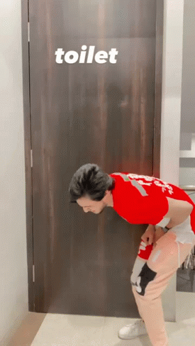 Anxious Man Waiting Outside Toilet GIF