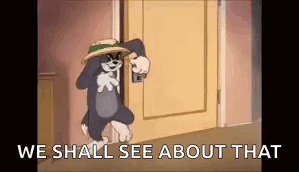 Tom And Jerry Are Standing In Front Of A Door With The Words `` We Shall See About That '' Written On It . GIF