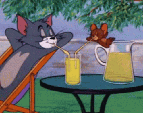 Tom and Jerry Drinking Orange Juice