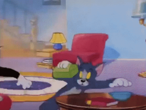 Tom And Jerry In Living Room GIF