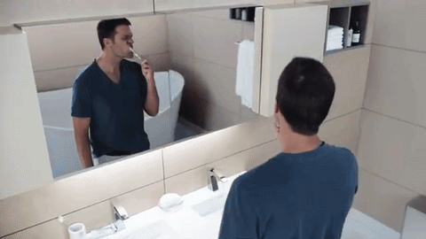 Tom Brady Brushing Teeth GIF