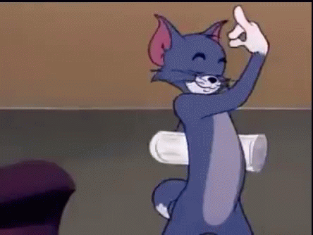 Tom Cat Dancing While Holding Newspaper GIF