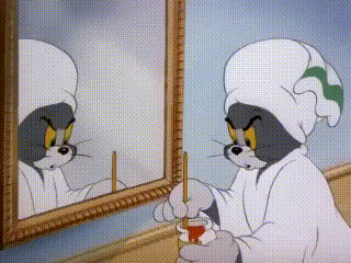 Tom Cat Painting Red Dots On His Face GIF