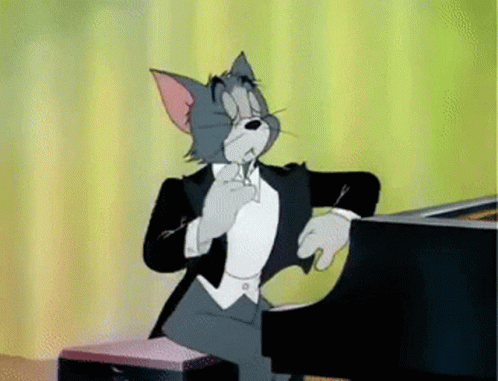 Tom Cat Preparing To Play Piano GIF
