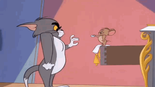 Tom Cat Slapping Jerry Mouse GIF