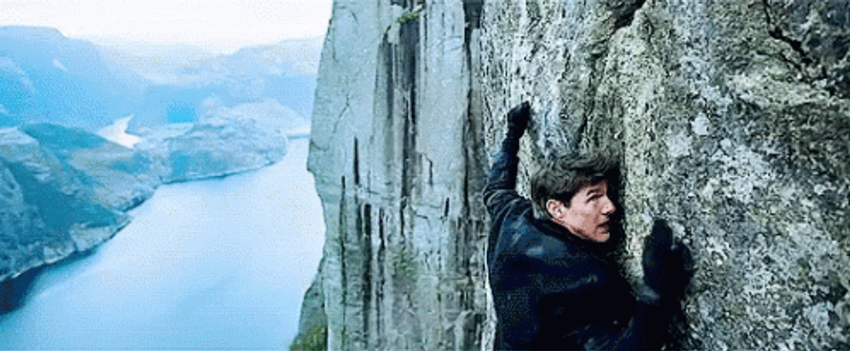 Tom Cruise Cliffhanger Moment In Mission Impossible GIF