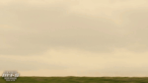 Tom Cruise Running Across Field