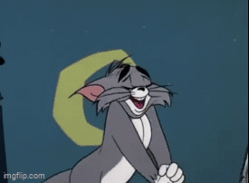 Tom From Tom And Jerry Is Laughing In Front Of A Squirrel GIF