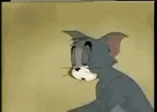 Tom From Tom And Jerry Sitting GIF