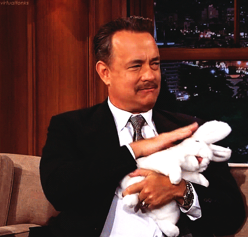 Tom Hanks Holding A Bunny GIF