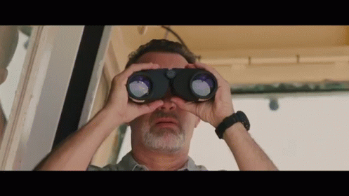 Tom Hanks Startled With Sight In Binoculars GIF