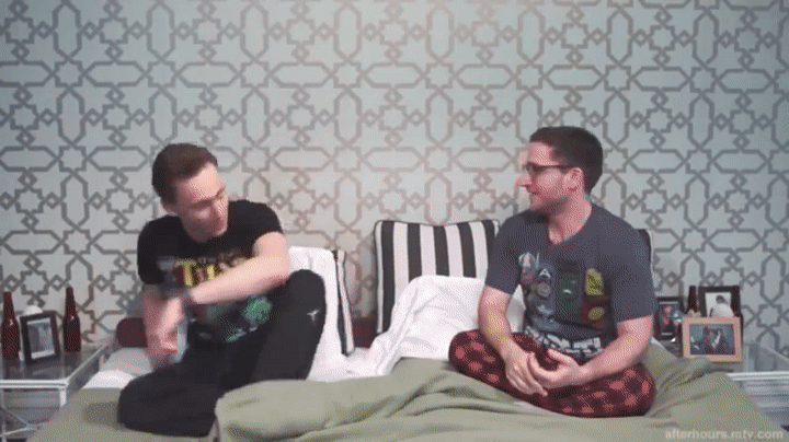 Tom Hiddleston Jumping In Bed GIF