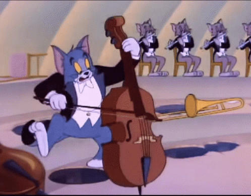 Tom Multitasking Solo Concert GIF