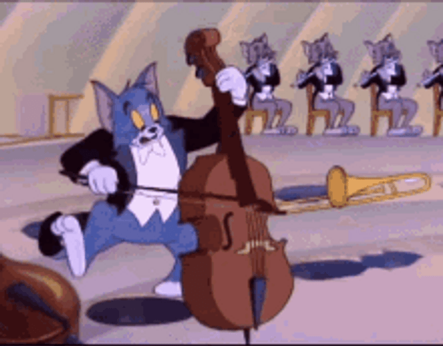 Tom Playing Instruments GIF