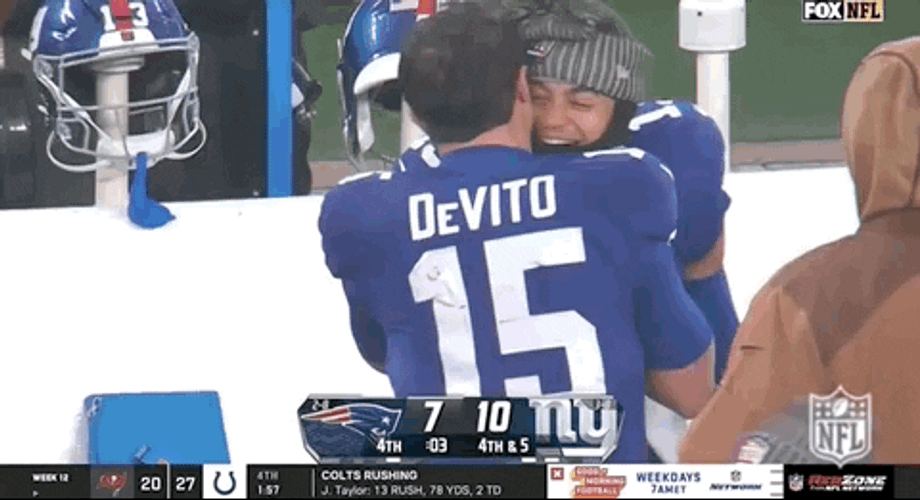 Tommy Devito Embracing Teammate GIF