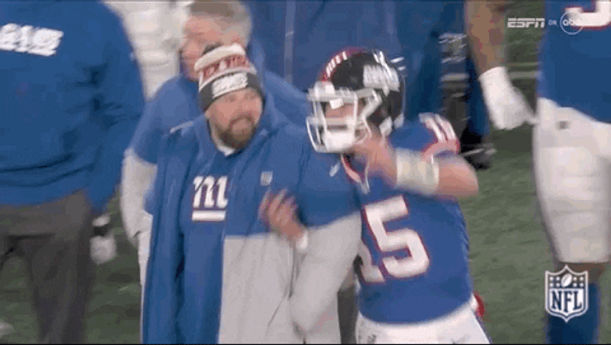 Tommy Devito Jumping Alongside New York Giants Coach GIF