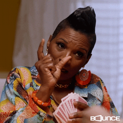 Too Small Woman Holding Cards GIF