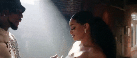 Toosii Touching Girl's Chin GIF