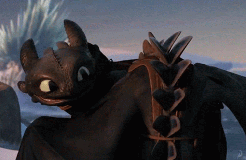 Toothless From How To Train Your Dragon Is Smiling And Looking At Something GIF