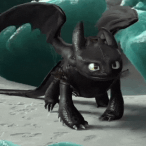 Toothless From How To Train Your Dragon Is Standing On A Rock Looking At The Camera . GIF