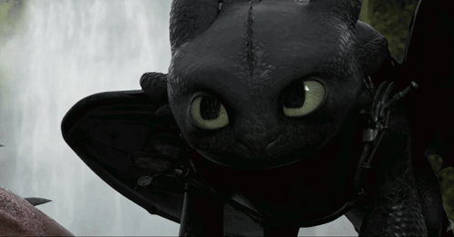 Toothless Standing Next to Waterfall
