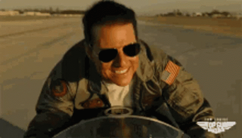 Top Gun Maverick Tom Cruise Riding Bike GIF