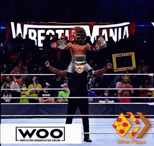 Top Hat Man Carrying Man in Woo Ring
