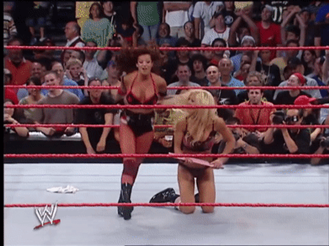 Torrie Wilson Exchanging Spanks In The Butt GIF