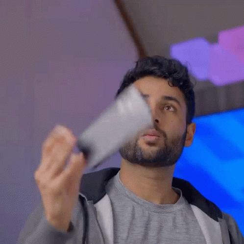 Tossing And Throwing Phone GIF