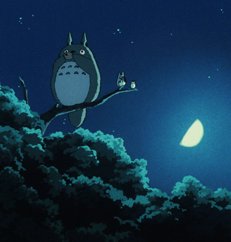 Totoro on Tree Branch With Two Small Birds