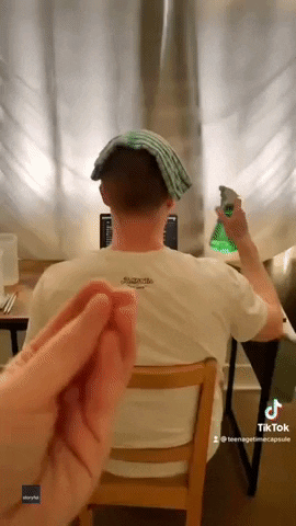 Towel On Head And Spray Bottle GIF