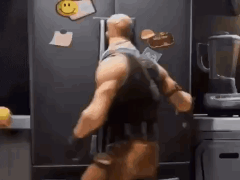 Toy Figure In Kitchen GIF