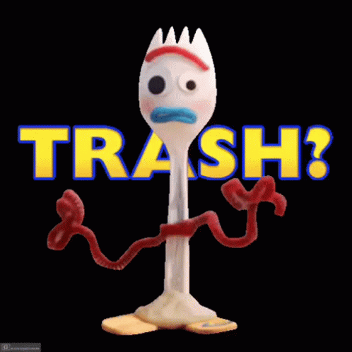 Toy Fork in Front of Trash ?