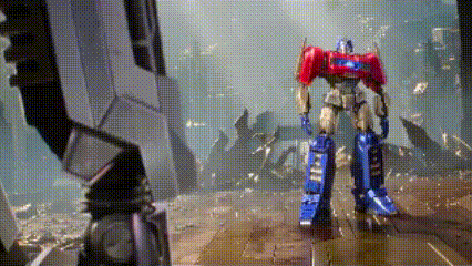 Toy Robot Standing on Concrete Floor