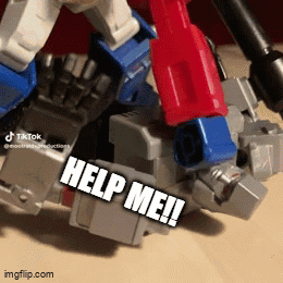 Toy Robot With Help Me on Leg