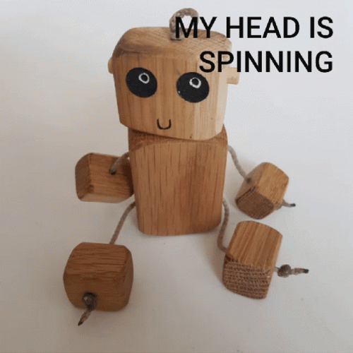 Toy Robot Wood Head Spinning GIF