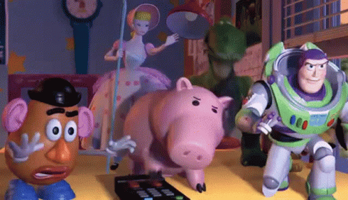 Toy Story Hamm Pressing Remote GIF